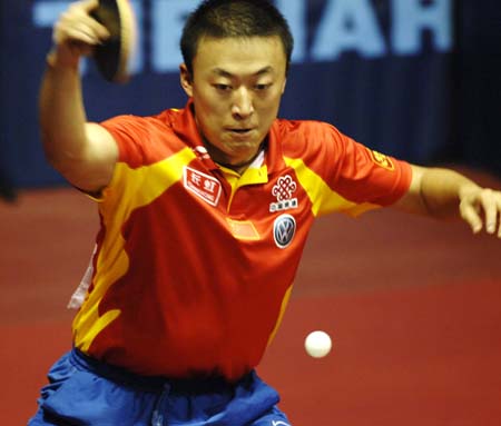 Chinese paddlers advance at table tennis worlds