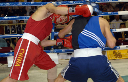 Boxer Li Yang titled in 57kg match in Bangkok